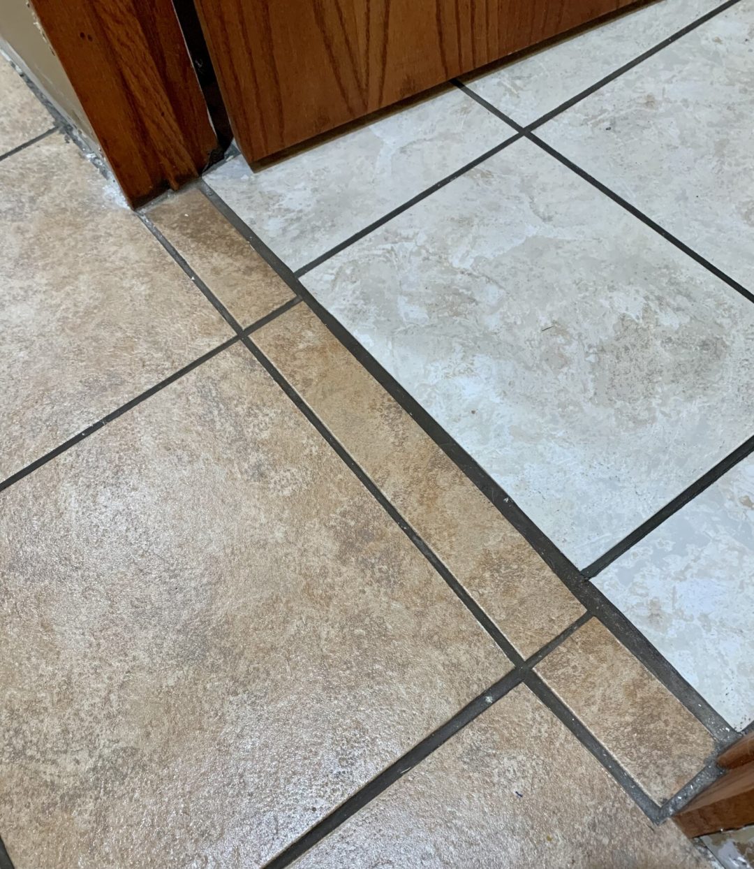 Wavy grout lines, peel-n-stick vinyl tile, oh my! ugly floor contest entry photo